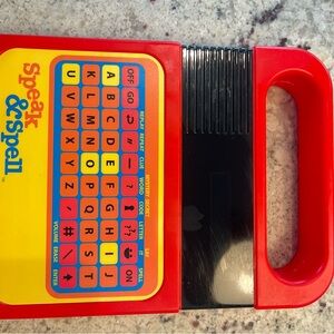Texas Instruments Speak & Spell Learning Toy - Red, Yellow, Blue